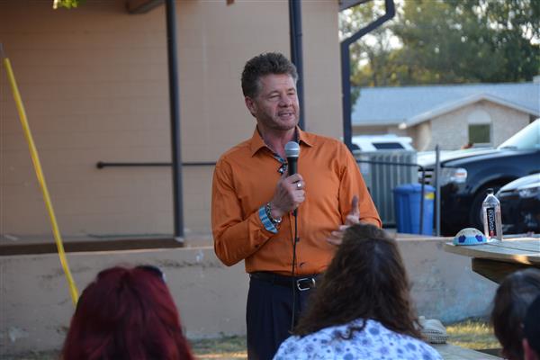 man-speaking-to-crowd